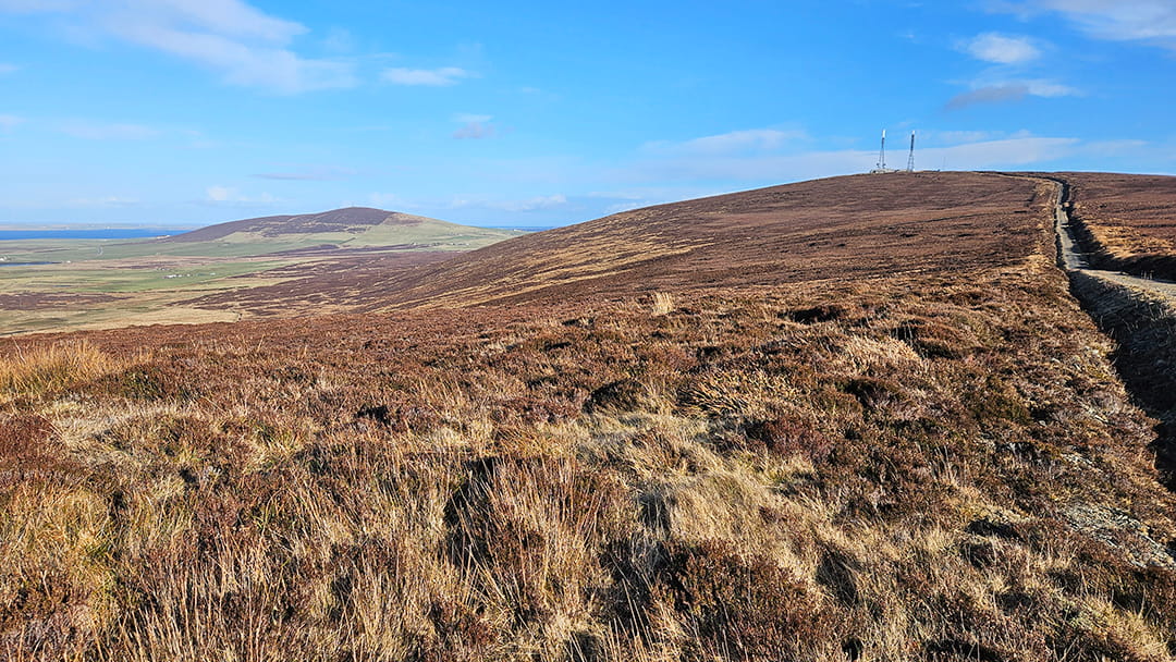 The road to Keelylang Hill with Wideford Hill in the distance