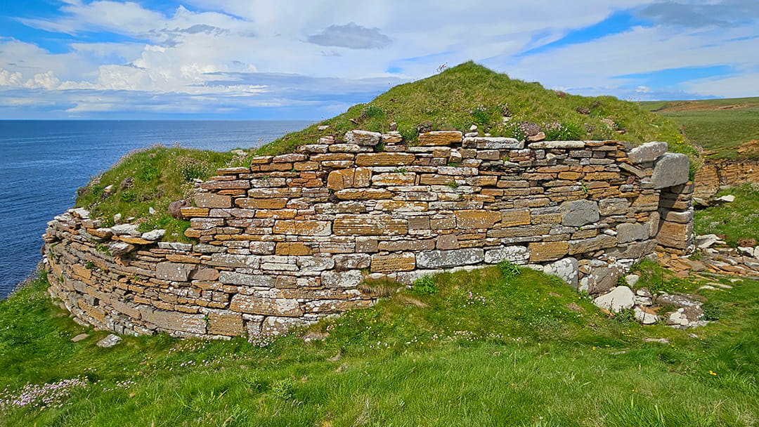The surviving broch wall built using large well-placed and faced stones