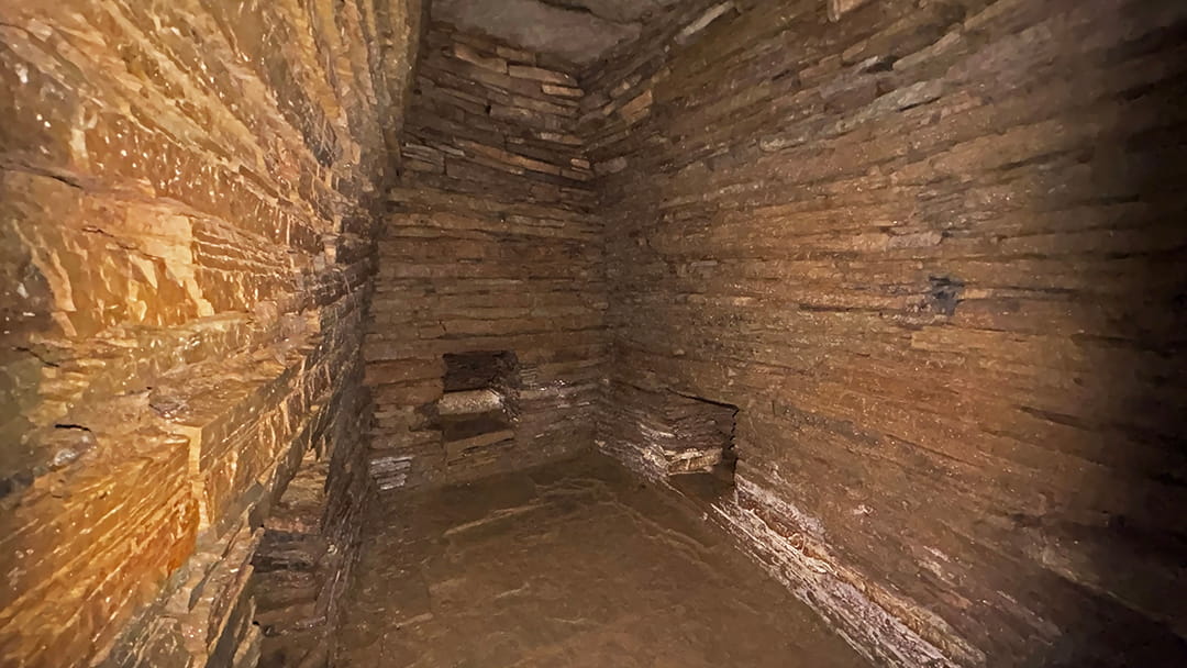 Inside the main chamber of Cuween Cairn