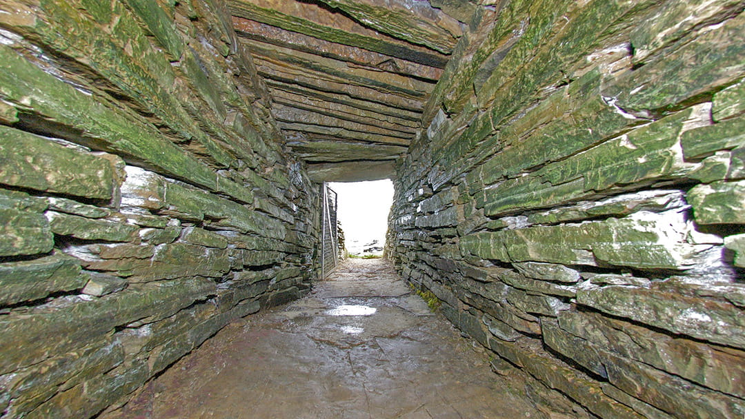Looking down the entrance tunnel into Cuween Cairn