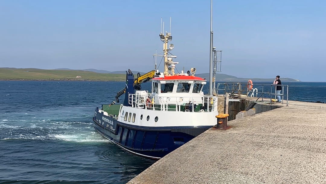 The ferry arriving into Moaness Pier on Hoy