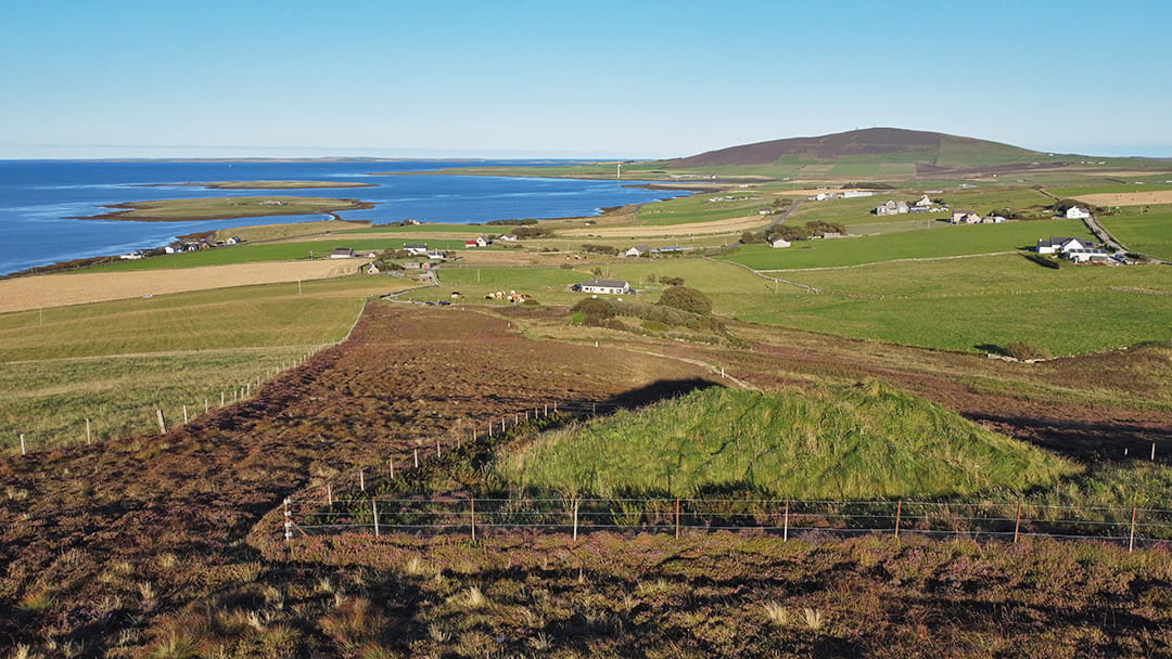 The view from Cuween Cairn across the Bay of Firth and to Wideford Hill