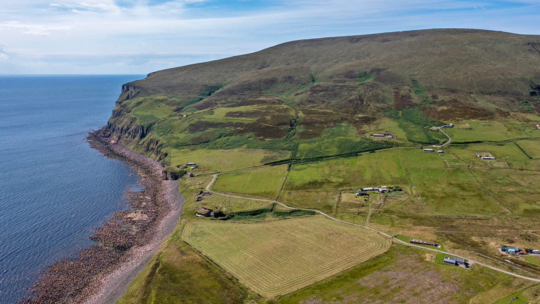 To reach the Old Man of Hoy from Rackwick, you must climb the Moor Fea hill