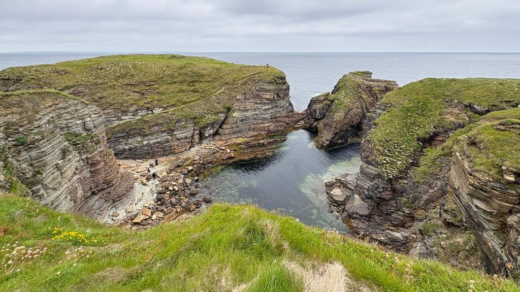 The rocky bay next to the Brough of Deerness at the Mull Head Nature Reserve