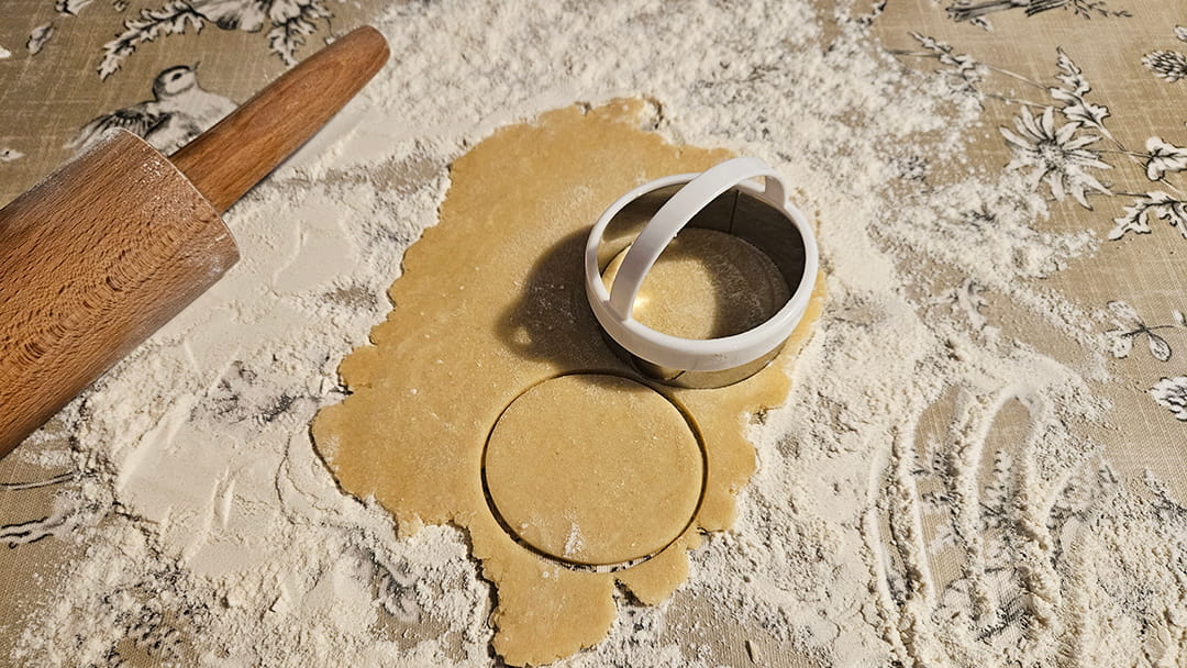 Roll onto a floured surface and cut into rounds