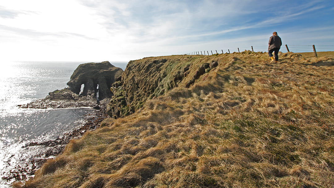 Walking to the alter at Harrabrough Head in South Ronaldsay
